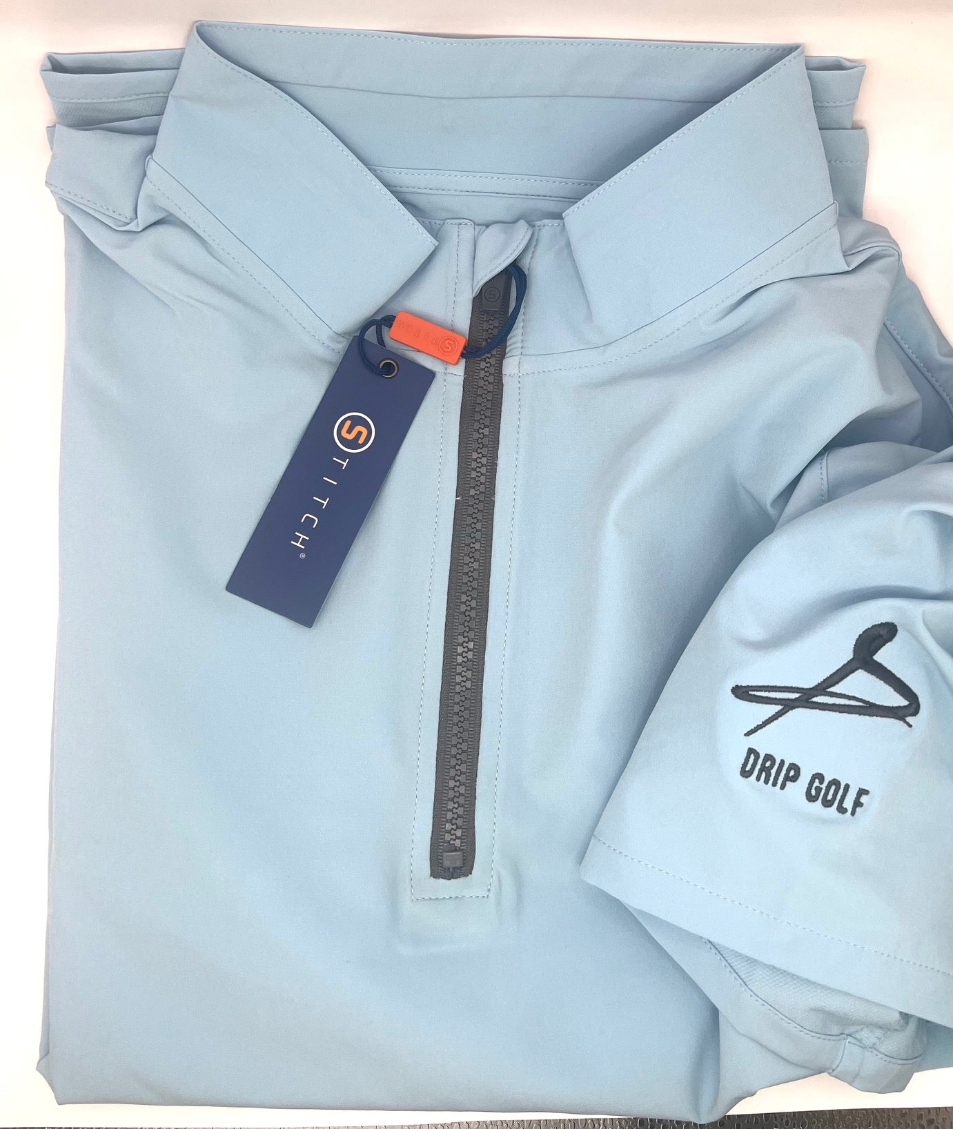Stitch Short Sleeve 1/4 Zip Pull-Over with Drip Golf Logo on the sleeve